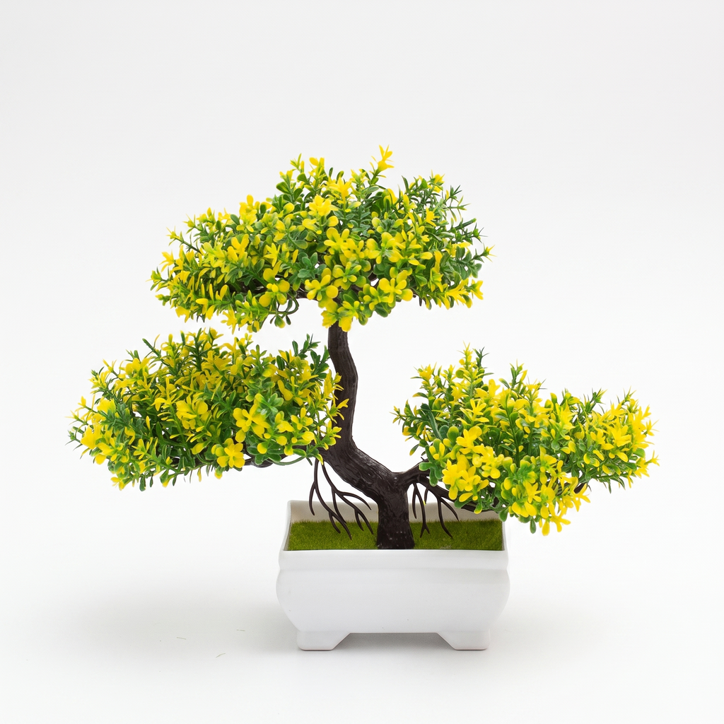Faux blossom bonsai tree on a pure white studio background