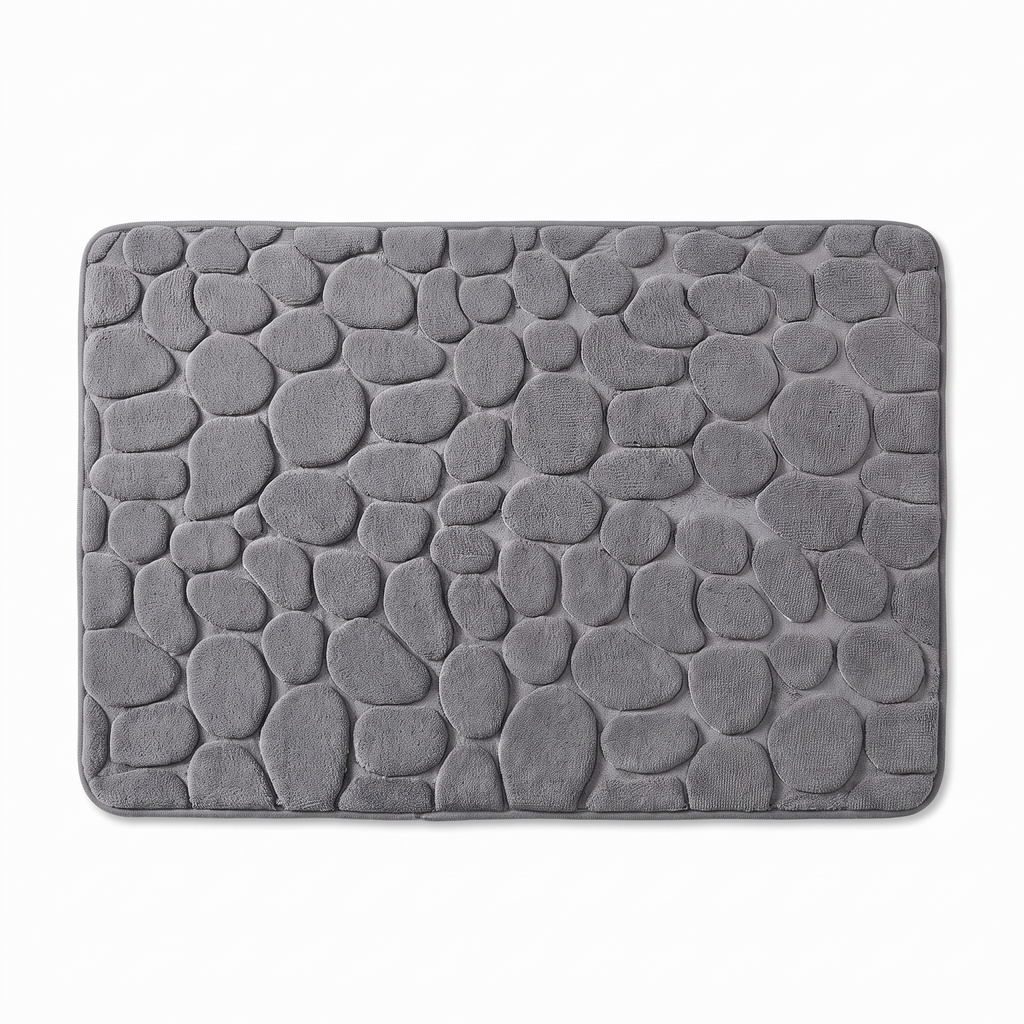 Grey cobblestone bath mat on white