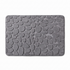 Grey cobblestone bath mat on white