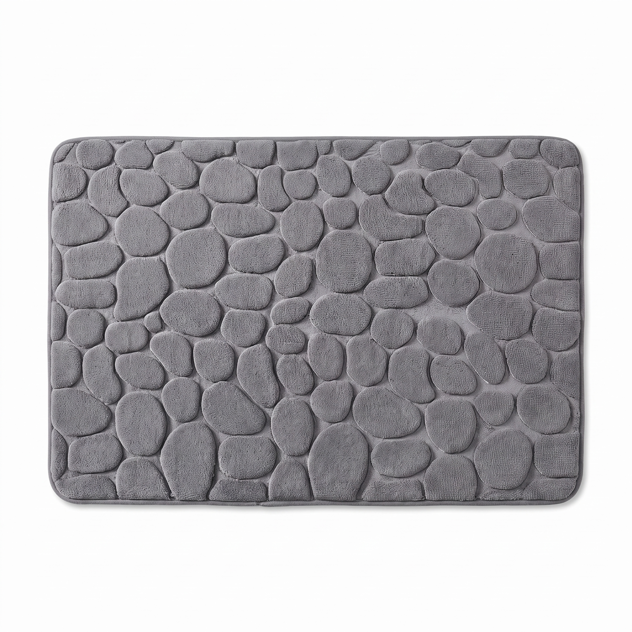 Grey cobblestone bath mat on white
